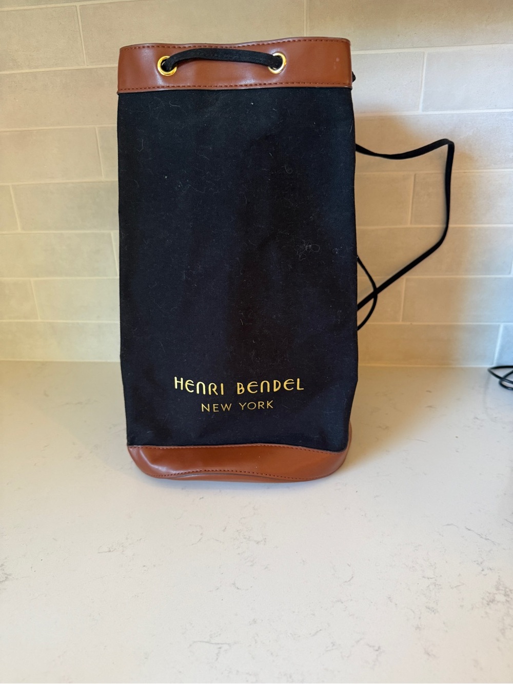 henri bendel Black and Brown Canvas Drawstring Backpack with Gold Logo